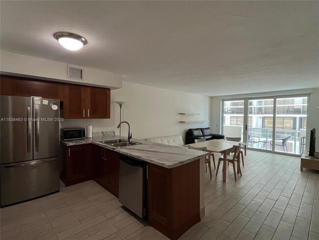 Building Photo - 9499 Collins Ave