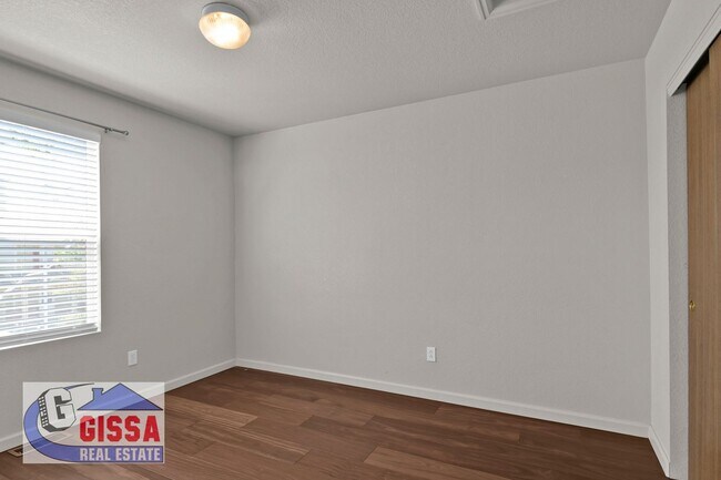 Building Photo - Cute home with engineered hardwood flooring throughout is available now!