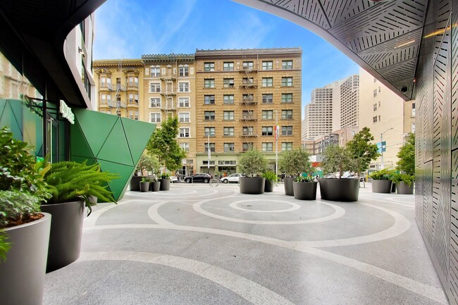 Building Photo - Urban Luxury at SoMa Serif Condos 2BR/2BA | In-Unit Laundry & 24-Hour Security