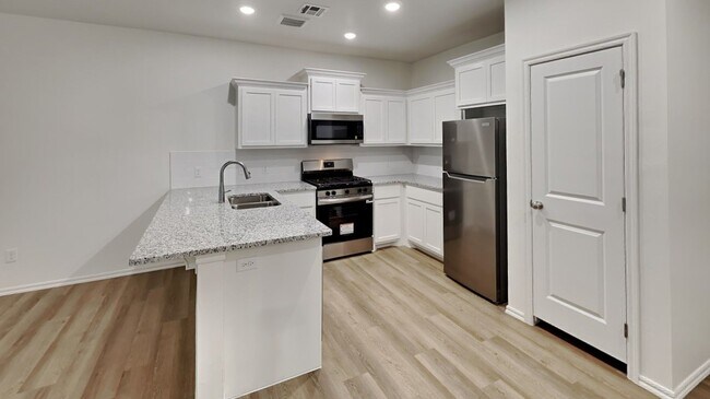 Building Photo - Welcome to Brand New Masonwood featuring this 3 Bedroom 2 Bath 2 Car Garage Duplex in a Great loc...