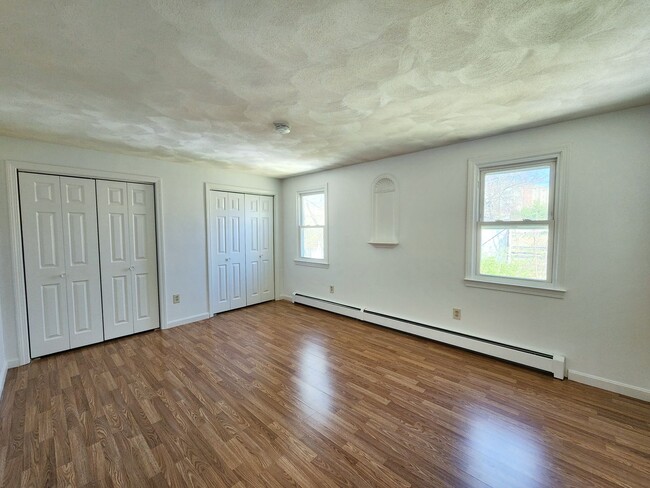 Building Photo - Beautifully remodeled townhouse with garage.
