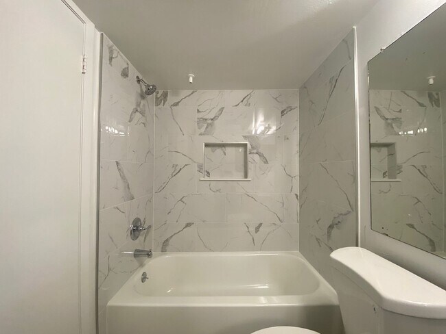 Building Photo - MOVE-IN SPECIAL!!!Charming 1-Bedroom Condo...
