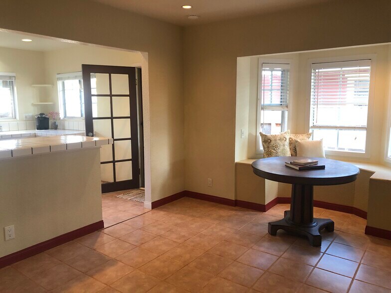 Breakfast knock and large counter.Porch off kitchen to side yard. - 2208 Gramercy Ave