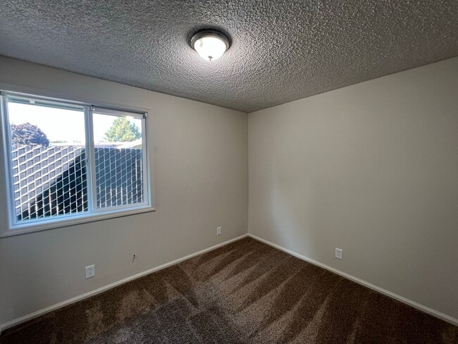 Building Photo - Beautifully Landscaped Two Bedroom