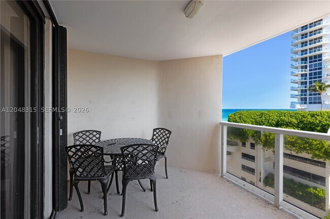 Building Photo - 6423 Collins Ave