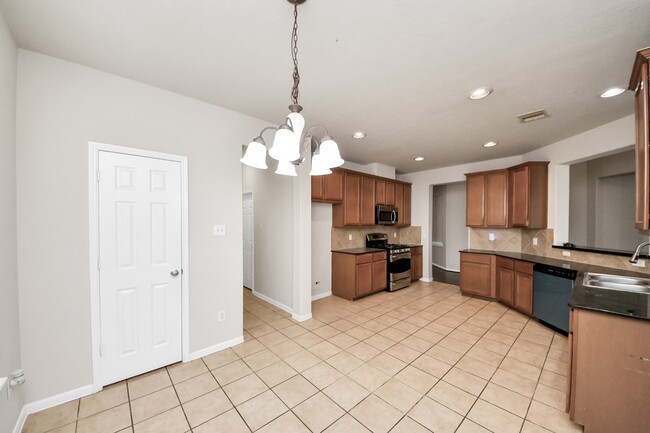 Building Photo - 24523 Red Bluff Tr