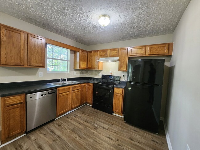 Building Photo - 5477 Denny Dr