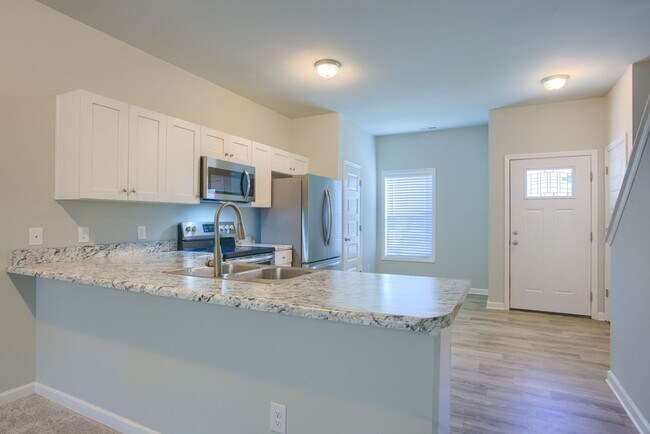 Building Photo - Charming 2-Bed, 2.5-Bath Townhome