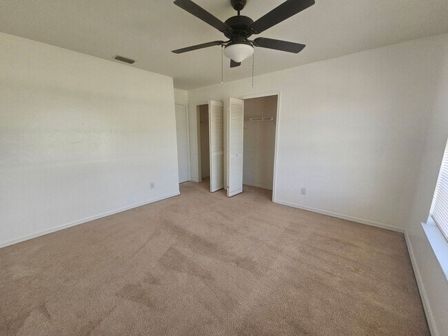 Building Photo - Freshly painted and brand new carpet/laminate 2 bed 2 bath 1 car garage single family home!!!