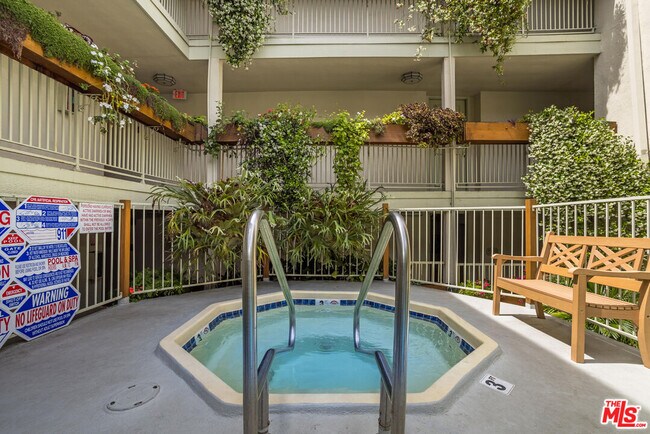 Building Photo - 1230 N Sweetzer Ave