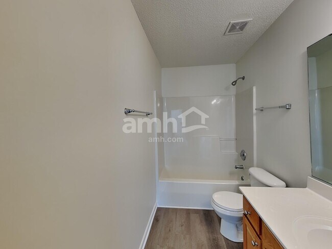 Building Photo - 5202 Carriage Woods Dr