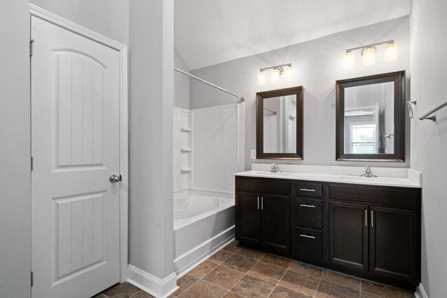 Building Photo - Pet Friendly Three Bedroom with Bonus!