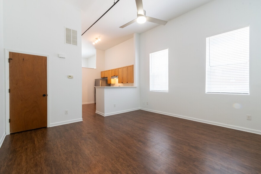 Spacious living room, high ceilings, open floor plan - Westview Lofts