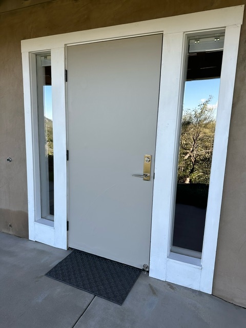 Private entry door from patio into studio apartment. - 7079 Engineers Rd