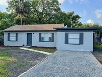 Building Photo - 4 Bedroom, 2 Bath House with Huge Fenced Yard, ALL Tile Floors!