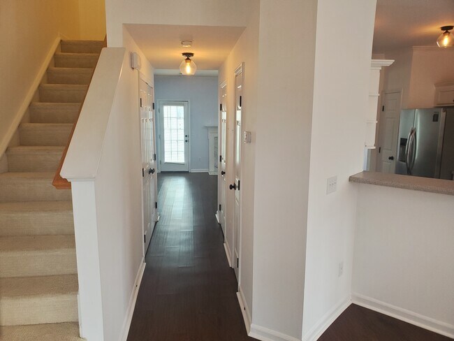 View through hallway front home entryway. - 42 Gr-Pd-51