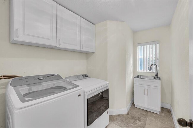 Building Photo - 5911 NW 59th Ave