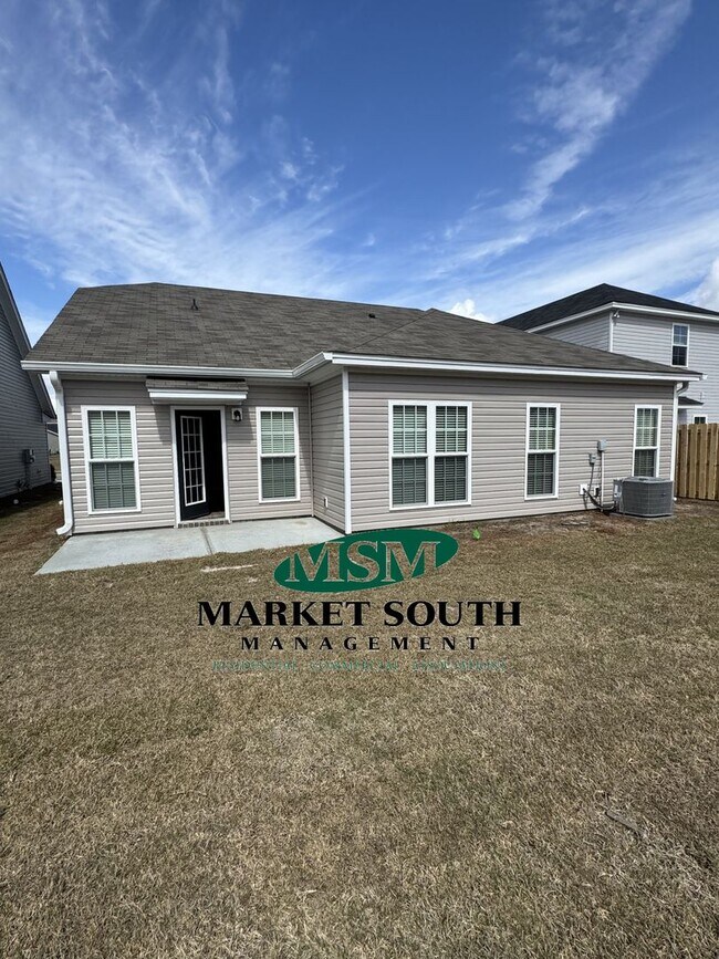 Building Photo - NEW CONSTRUCTION WITH PRIVACY FENCED YARD
