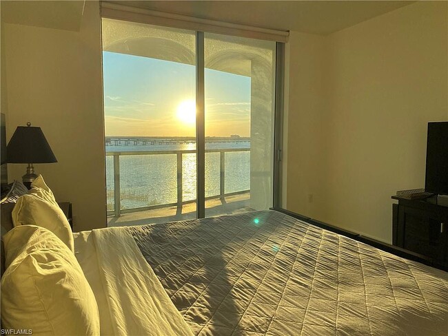 Master bedrorom with river and sunset views - 2825 Palm Beach Blvd