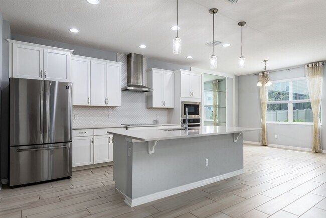 Building Photo - PRATICALLY BRAND NEW HOME IN GATED COMMUNITY!