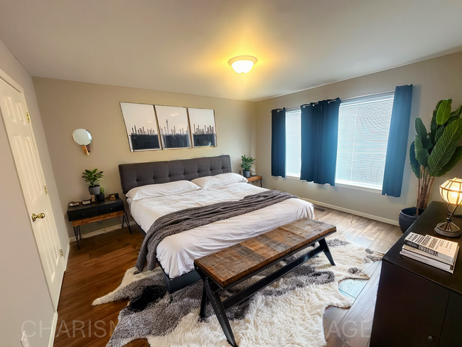 Building Photo - WALK IN LEVEL 2 BD, 1 BA CONDO WITH WOOD F...