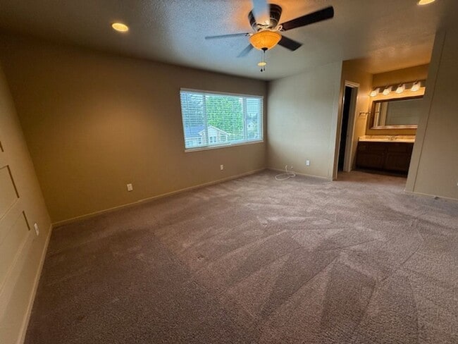 Building Photo - OPEN HOUSE this Wednesday 5pm-6:30pm - Private Redwood Setting | 4BR Home with Family Room, Bar &...