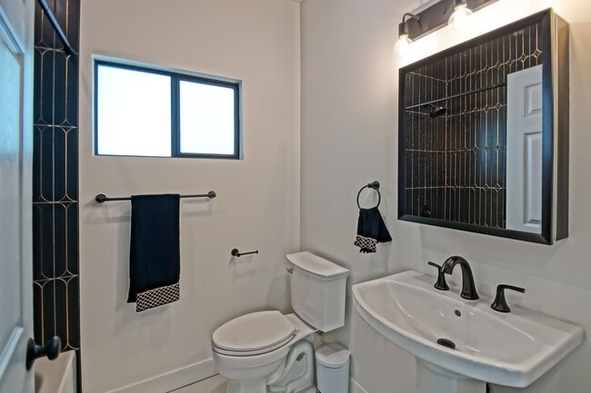 Building Photo - Beautifully Remodeled, Bright & Modern 4BR3BA Home w/ 2BR1BA Guest House On Sprawling Corner Lot ...