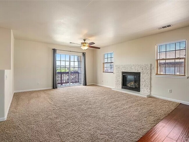 Livingroom Balcony and Fireplace - 833 Marlbank Pl