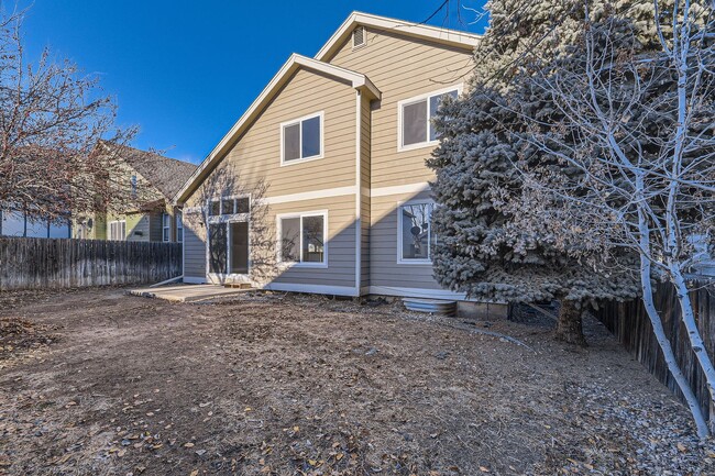 Building Photo - 4 bedroom, 2 1/2 bath home with attached 2...