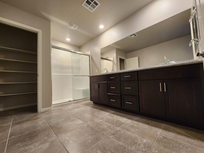 Building Photo - A Fairly New Home with 5 Bedrooms in a gated community