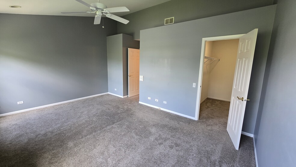 Primary bedroom and closet - 2807 Stonewater Dr