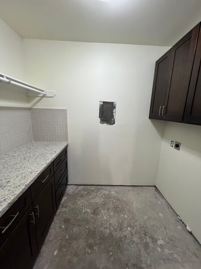 Laundry room off the storage room - 6015 Heffernan St