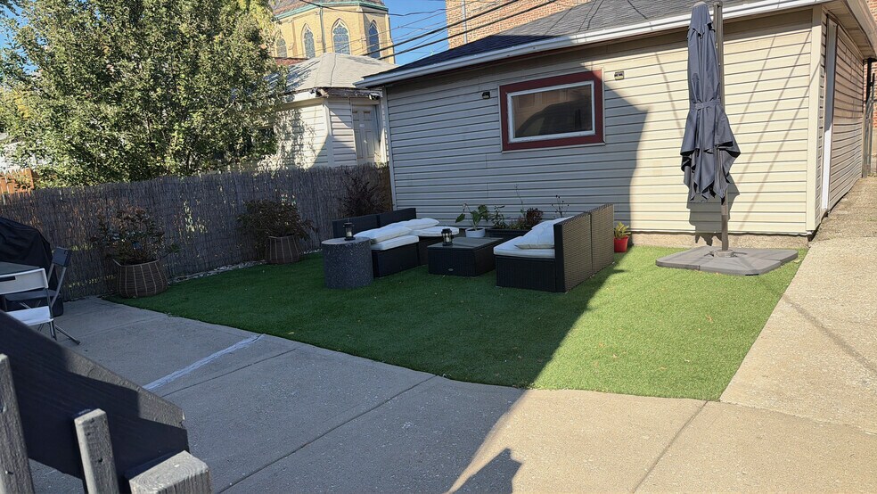 Backyard with Newly Installed Turf - 1032 W 31st Pl