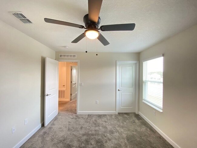 Building Photo - Spacious 4-Bedroom Home in Kissimmee – Ava...