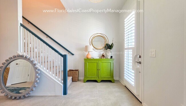 Building Photo - EXCEPTIONAL AND SPACIOUS FURNISHED TOWNHOME WITHIN WATERSIDE- NAUTIQUE!