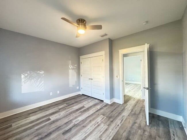 Building Photo - Palm Heaven!!Application and more info @ https://www.sandseekerrealty.com/long-term-rentals/. Cli...