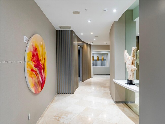 Building Photo - 10275 Collins Ave