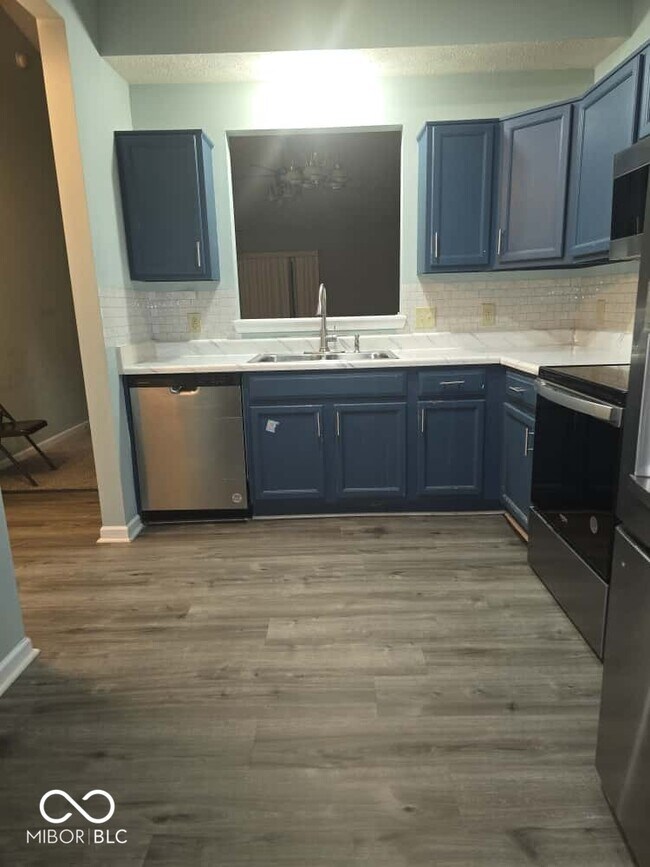 Building Photo - 8209 Twin River Dr