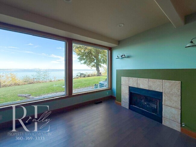 Building Photo - Waterfront Rustic Retreat with Vaulted Ceilings, Picture Windows & Lofted Nook