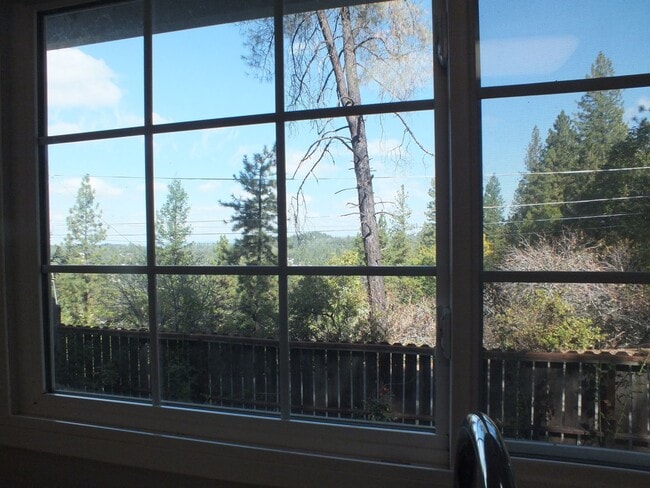 Building Photo - Placerville 2/1 with garage and small yard...