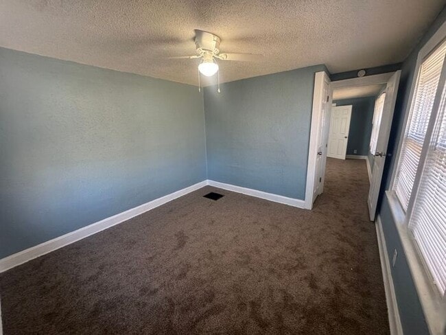 Building Photo - Charming 3BR 2BA Home w/ Fenced Yard + Covered Porch in KC