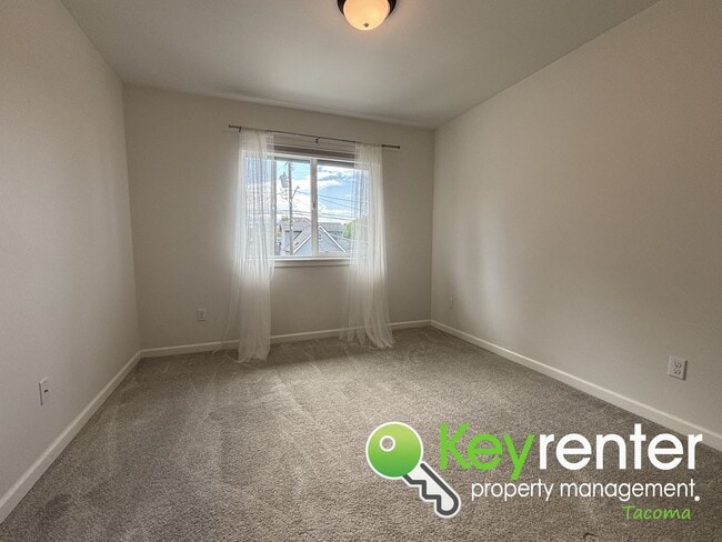 Building Photo - Stylish 4-Bedroom Home with Finished Basem...