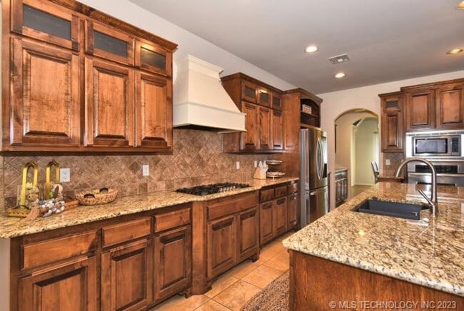 Building Photo - Room for the whole family in this 5 bedroom, 3-1/2 bath Executive Rental on corner lot in Millice...