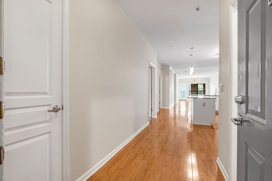 Entering the Condo. Coat closet on the left and launcry room and additional storage to the right - 1803 Broadway