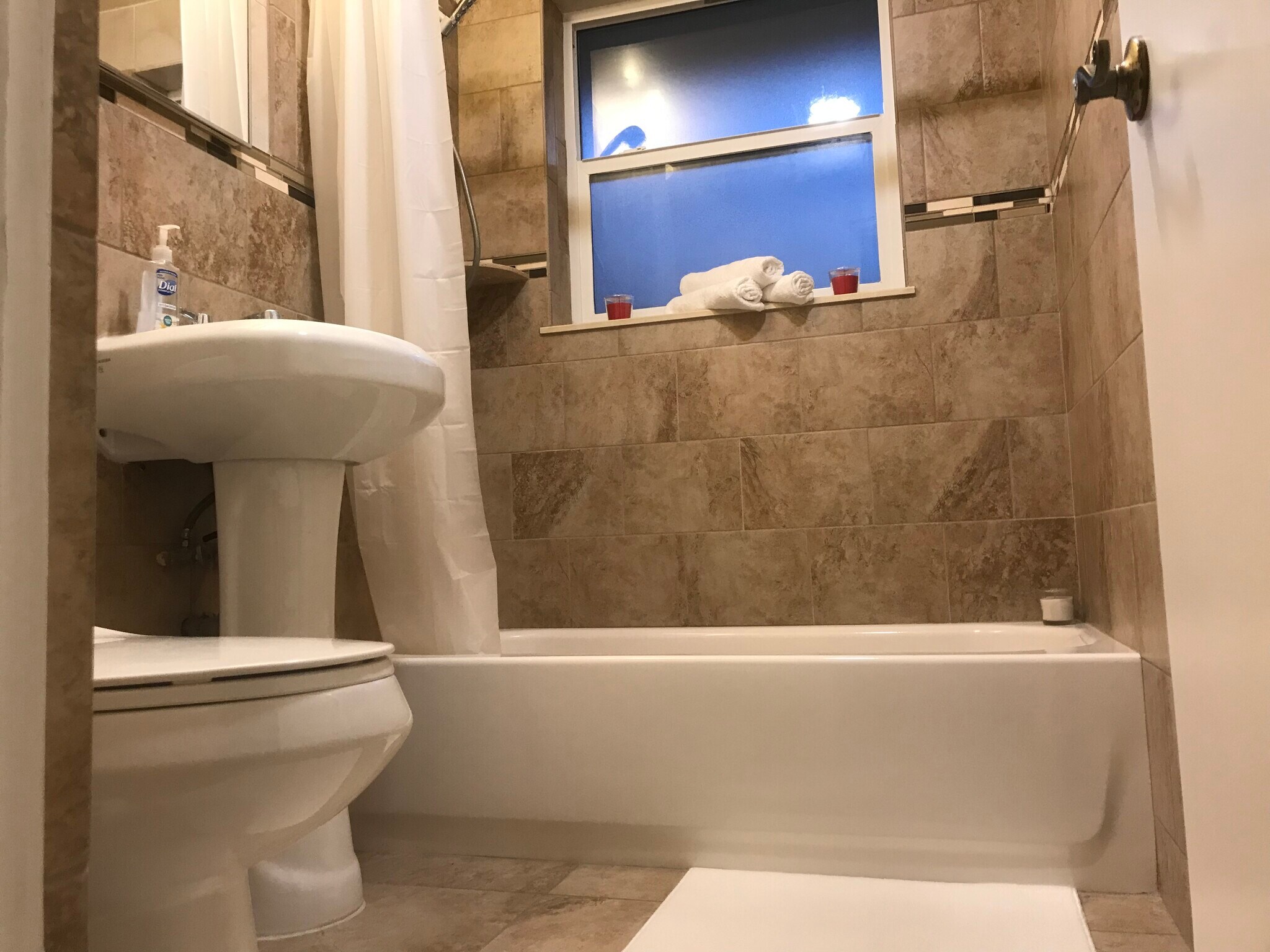 Tub and sower bathroom. - 2440 Manasota Beach Rd