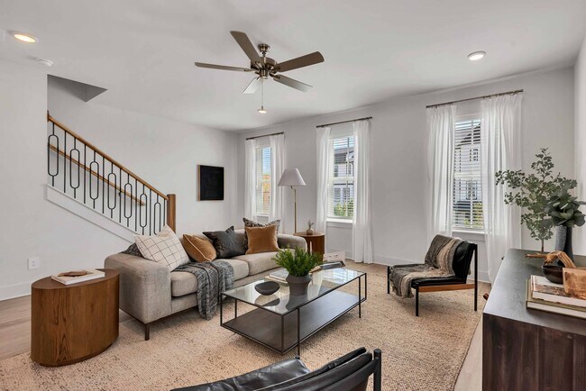 Living Room with Staircase to Third Floor - The Aria Townhomes