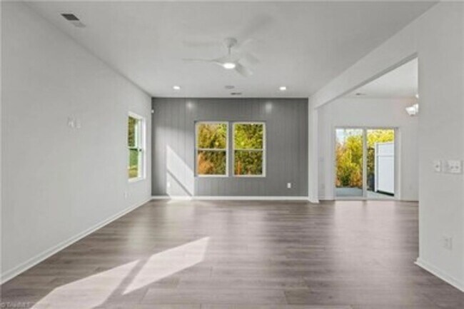 Building Photo - Spacious 3-Bedroom Townhome with Private Patio, Central HVAC & In-Unit Laundry Hookups