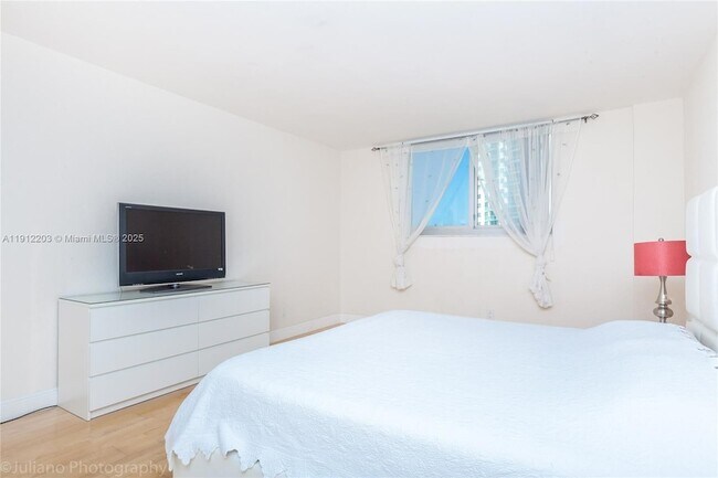 Building Photo - 19380 Collins Ave