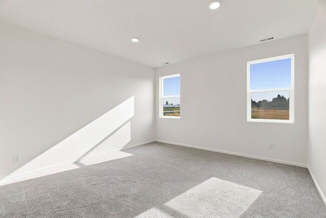 Building Photo - Modern 4-Bedroom Home with a 3-Car Garage & Covered Patio