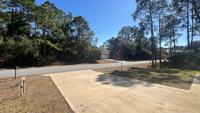 Building Photo - Spacious 4BR Home with Well Water, Pet-Friendly & No HOA